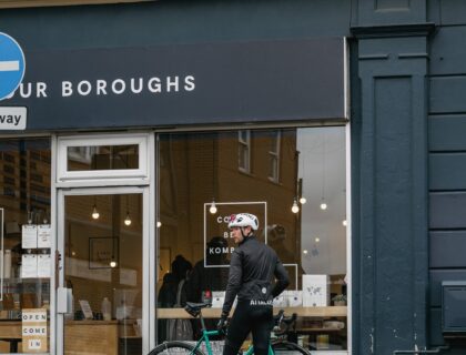 cyclist in front of coffee shop