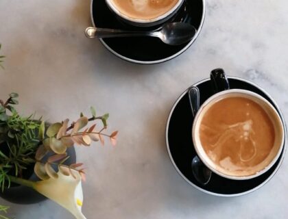 two coffees on a table