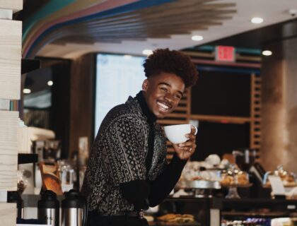 Man with coffee cup in hand